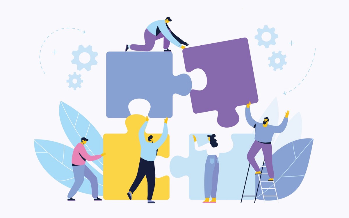 Illustration of a team building a jigsaw puzzle